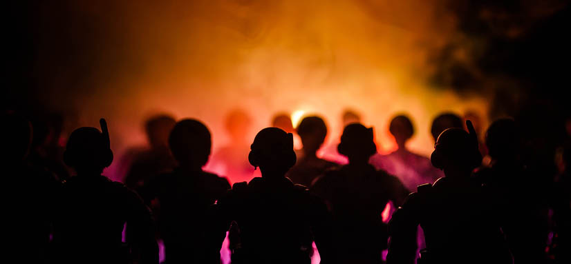 Anti-riot police give signal to be ready  Government power concept  Police in action  Smoke on a dark background with lights  Blue red flashing sirens  Dictatorship power