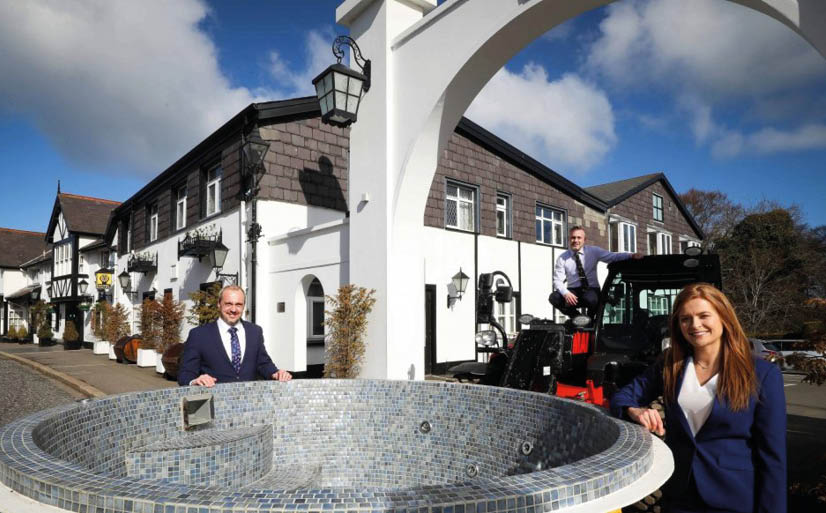 A picture containing sky, outdoor, building, person  Description automatically generated