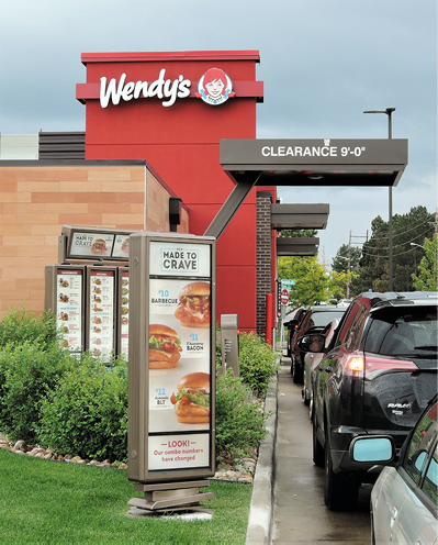 Aurora, CO, USA  June 27, 2019  Wendy's fast food restaurant drive thru line at 3110 Parker Road in Aurora, Colorado during a busy lunch hour  