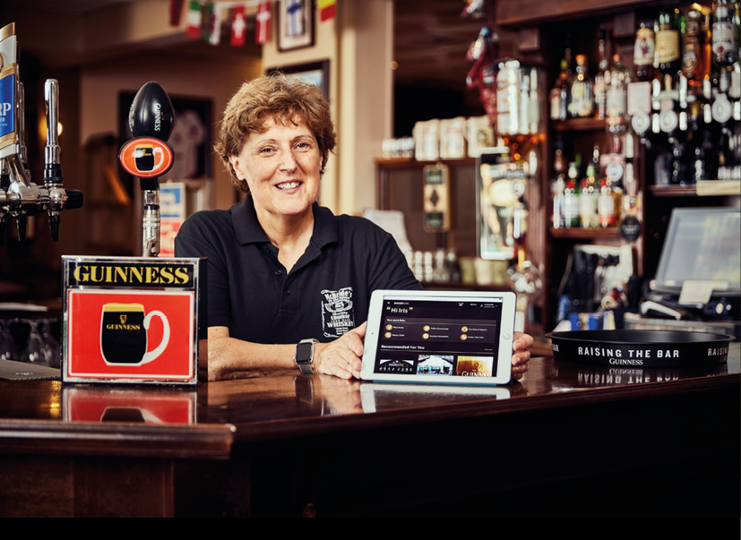 A person sitting at a bar  Description automatically generated with medium confidence