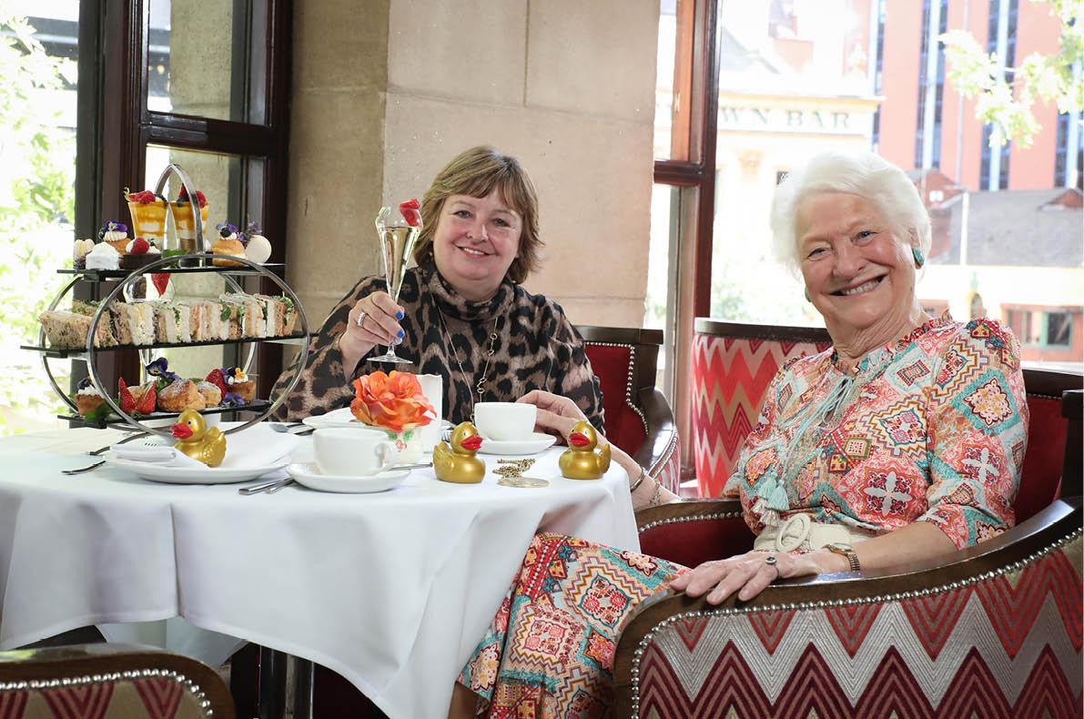 Press release image   Press Eye - Belfast - Northern Ireland - 11th August 2022  JOIN LADY MARY PETERS AS SHE CELEBRATES 50 YEARS OF OLYMPIC SUCCESS Lady Mary Peters is joined by Julie Hastings, Marketing Director of Hastings Hotels ahead of a special afternoon tea at the Europa Hotel on Sunday 4th September in celebration of the 50th anniversary since she won gold at the Munich Olympic Games    Guests will enjoy a 70 s themed afternoon tea as Lady Mary steps back into the seventies and relives her favourite Golden Years memories as she is joined by a host of special guests  There will also be live music from the Abba Tribute: Lovelight, a ballot and special Hastings Golden Ducks signed by Lady Mary  The proceeds raised will benefit the Mary Peters Trust  For further information or to purchase tickets (priced  50pp or  450 for a table of 10) phone 028 9068 6730 or email info marypeterstrust org   Photo by Kelvin Boyes   Press Eye   