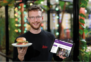 safefood is encouraging small food businesses in Northern Ireland to benefit from its free food safety e-learning tool - 'safefood for business’ - as new research shows that nearly two-thirds (64%) of local food enterprises have extreme concerns with the consequences of food safety breaches. Pictured using the 'safefood for business’ free food safety e-learning tool is Steven Orr from Bodega Bagels. 