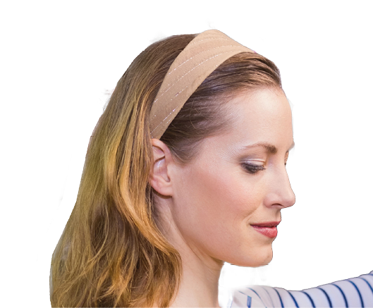 Pretty blonde woman holding a bottle of red wine at supermarket