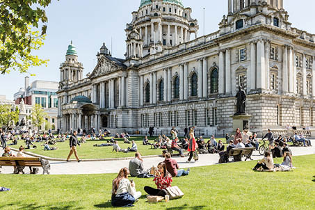 Belfast, Antrim, Northern Ireland - 03 May, 2017: Belfast City Hall and Grounds, on a sunny day 