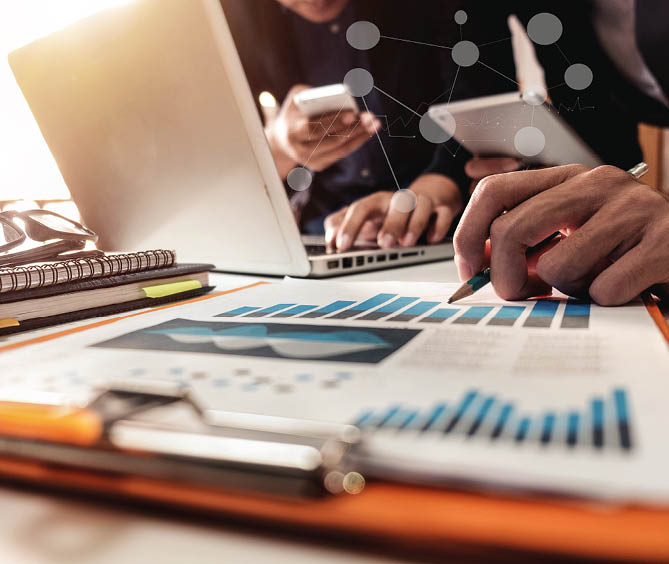 Double exposure of success businessman working in office with digital tablet laptop computer and smart phone in morning light