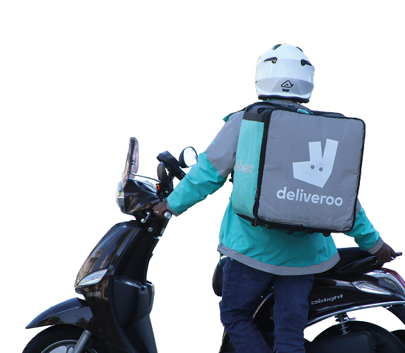 Nottingham, England, United Kingdom - May 20th 2020: Deliveroo driver with Scooter waiting for job   Deliveroo takeaway delivery driver waits in the sun for his next order in Nottingham city centre 