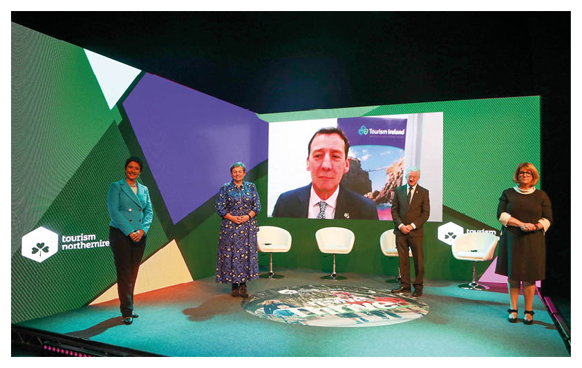 Press Eye - Belfast - Northern Ireland -  24th November 2021   Photo by Matt Mackey     Press Eye    Pictured at the ICC Belfast for the Tourism in Action update are (L-r) Jo Scott, TV Presenter, Joanne Stuart, Northern Ireland Tourism Alliance, John McGrillen, Tourism NI, Janice Gault, Northern Ireland Hotels Federation and, on screen, Shane Clarke, Tourism Ireland 