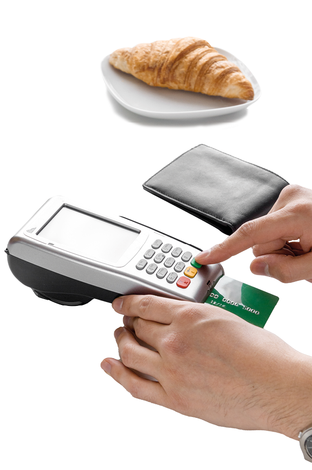 Croissant and coffee on white table payment by card in cafe