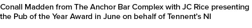 Conall Madden from The Anchor Bar Complex with JC Rice presenting the Pub of the Year Award in June on behalf of Tenn...