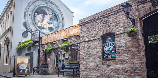 BELFAST, NORTHERN IRELAND- MAY, 2018: Belfast's Cathedral Quarter, a popular area of Belfast City for its nightlife, bars and restaurants