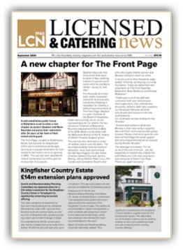 A person in a suit and tie Description automatically generated