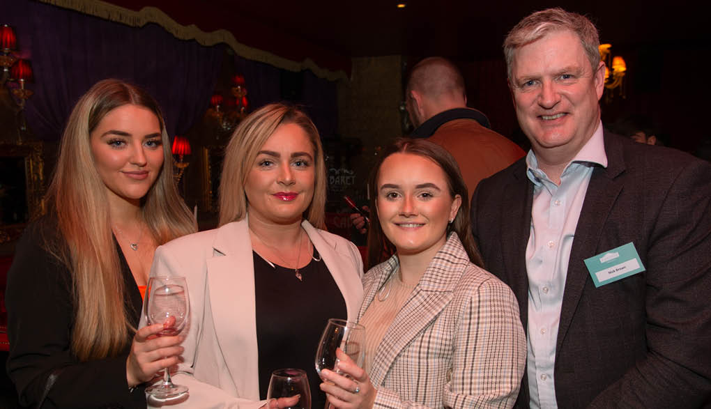Sally Dawson, Shelley Magee and Lauren Beattie, of Banbridge Rugby Club, with Nick Brown of Bibendum Wines NI.