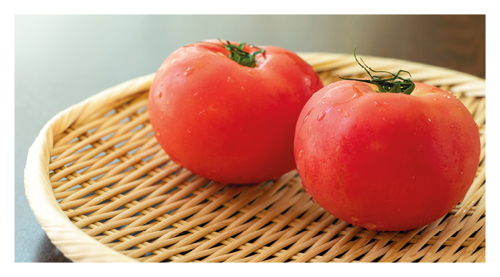 Fresh red tomatoes with water drops