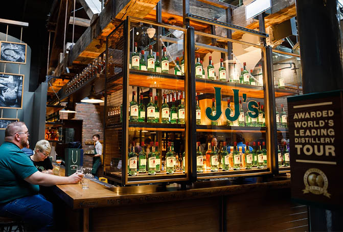 DUBLIN, IRELAND - JULY 2, 2019: Interior and bar of Old Jameson Distillery, Smithfield Square in Dublin, Ireland. The original site where Jameson Irish Whiskey was distilled until 1971
