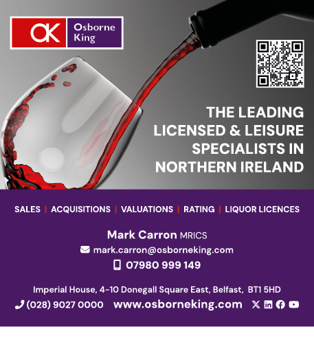 A wine glass with red wine in it. Description generated by AI