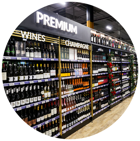 A store with a large selection of wine bottles. Description generated by AI
