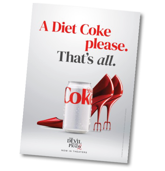 A can of diet coke with a pair of red high heels. Description generated by AI