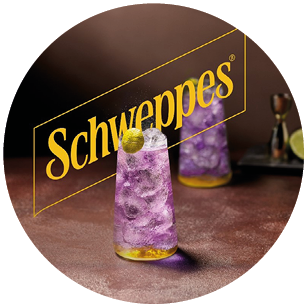A bottle of Schepes is on a table. Description generated by AI