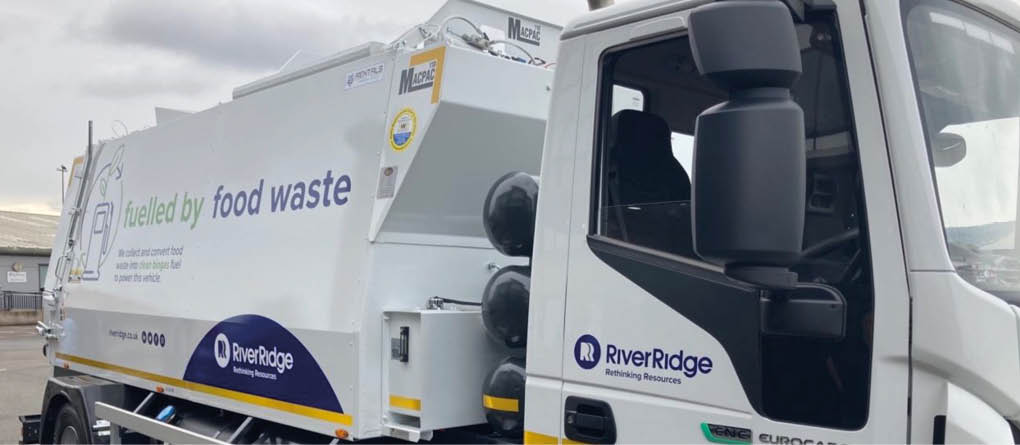 A large white truck with a blue stripe is parked in a lot. AI generated content