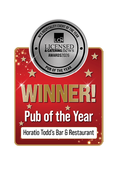 A red and gold award graphic with stars announces Horatio Todd's Bar & Restaurant as the winner of the Licensed & Catering News Pub of the Year Award 2026. Description generated by AI