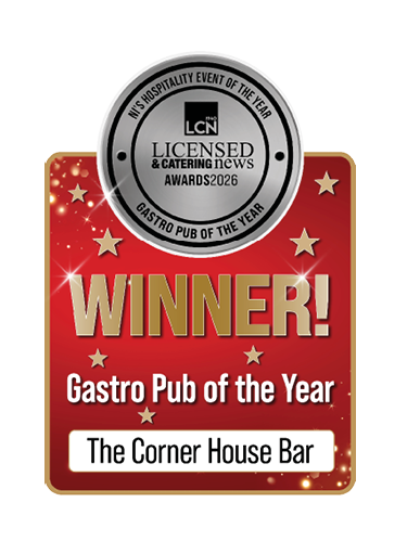 A red and gold award graphic with a silver seal at the top reading Licensed & Catering News Awards 2026 for NHS Hospitality Event of the Year and Gastro Pub of the Year, with bold gold text stating Winner and white text naming The Corner House Bar as Gastro Pub of the Year. Description generated by AI