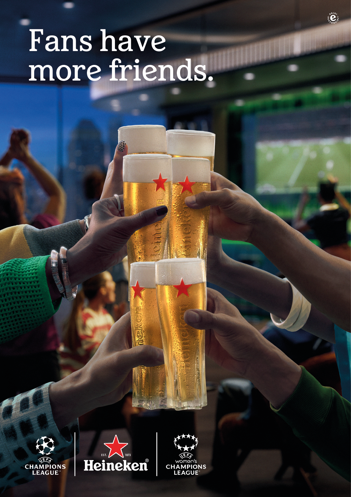 A group of people holding up beer glasses. Description generated by AI