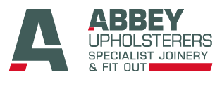 The logo features a large stylized letter A with red accents and the text Abbey Upholsterers Specialist Joinery & Fit Out in a modern, bold font. Description generated by AI
