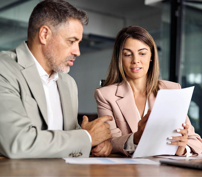 Business woman lawyer manager holding legal documents consulting mature older client at office meeting, two professional executives experts discussing financial accounting papers working together.