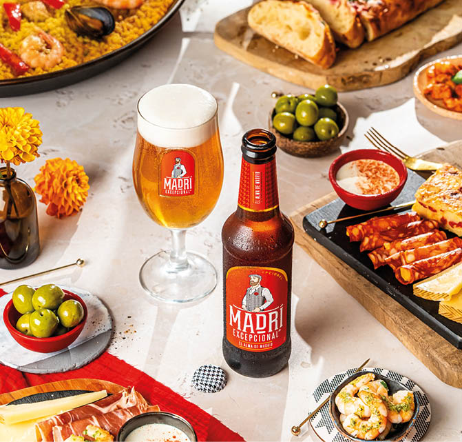 A table with food and drinks. Description generated by AI