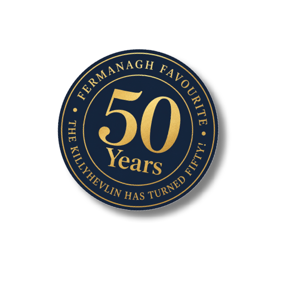 A gold and blue circle with the words “Fermagh favourite" written in gold. Description generated by AI