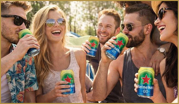 A group of people sitting on a blanket, drinking beer. Description generated by AI
