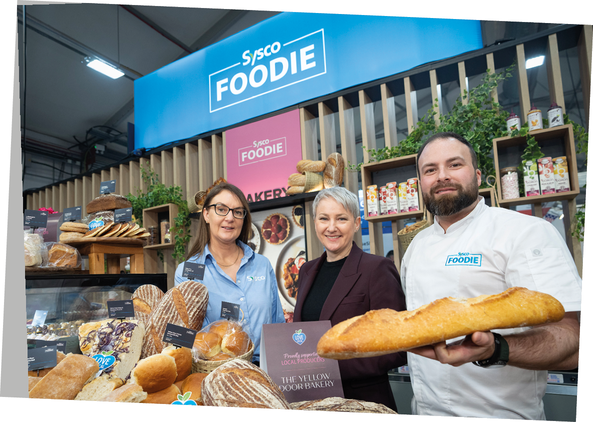 Image : Joanne Cunningham, Merchandising Director at Sysco Ireland, Gr inne Moody, Director of Food and Drink at Invest NI, and Kyle Greer, Sysco Development Chef at Sysco Ireland at the launch of ‘Scale with Sysco’, a comprehensive mentorship programme that leverages Sysco’s scale, expertise and customer network to help small suppliers thrive, which was unveiled at IFEX. 