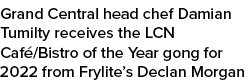 Grand Central head chef Damian Tumilty receives the LCN Caf /Bistro of the Year gong for 2022 from Frylite’s Declan M...