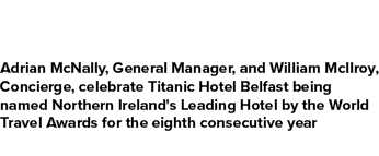 Adrian McNally, General Manager, and William McIlroy, Concierge, celebrate Titanic Hotel Belfast being named Northern...
