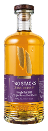 A clear glass bottle with a wooden cap contains amber-colored Two Stacks Irish Whiskey labeled as single pot still triple stoney cask finish. Description generated by AI