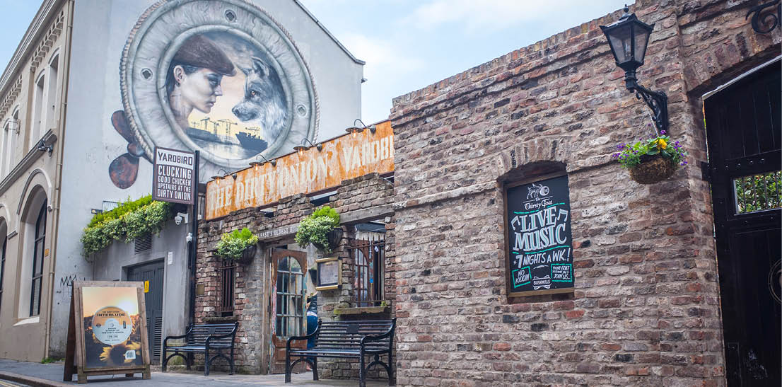 BELFAST, NORTHERN IRELAND- MAY, 2018: Belfast's Cathedral Quarter, a popular area of Belfast City for its nightlife, bars and restaurants