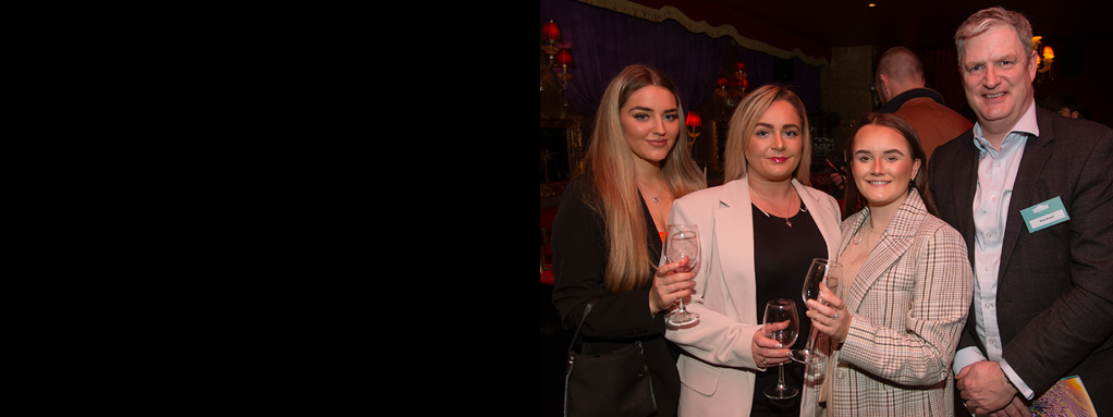 Sally Dawson, Shelley Magee and Lauren Beattie, of Banbridge Rugby Club, with Nick Brown of Bibendum Wines NI.