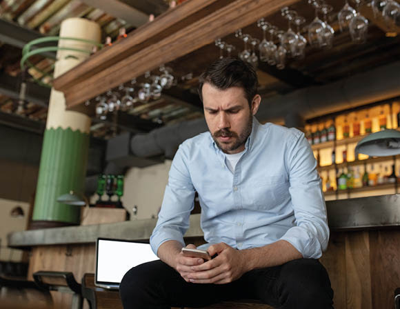 Restaurant, cafe, bar closed due to COVID-19 or Coronavirus outbreak lockdown, stressed owner of small business, depression. Businessman exhausted, upset. Business, economy, finance crisis.