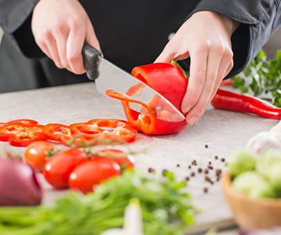 chef cooking food kitchen restaurant cutting prepare cook hands healthy hotel man male knife preparation fresh preparing young natural culinary domestic desktop dietary red concept - stock image 