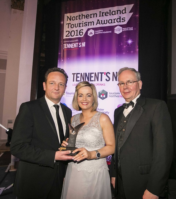 Galgorm Resort & Spa, Ballymena picked up the prize for Hotel of the Year and pictured (L-R) are Paul Smyth and Lauren McAteer with Brendan Dowdall of First Trust Bank.