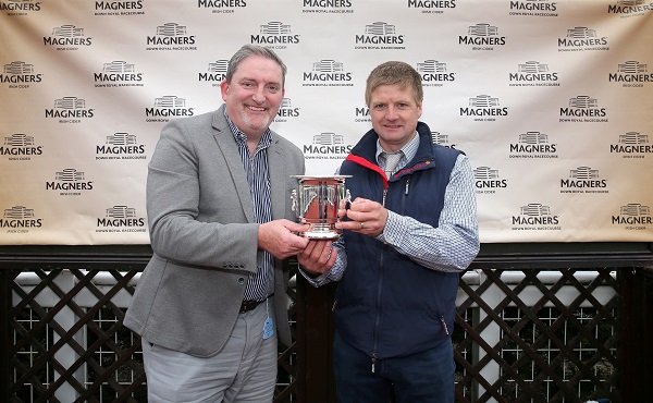 Terry McCourt (left), territory manager for Tennent’s NI is pictured presenting the trophy for the €100,000 prize Magners Derby race, won by Stellar Mass, to John Griffin, who represented owner June Judd.