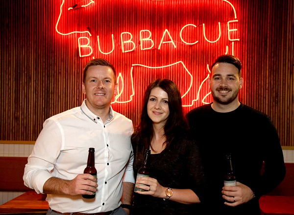Pictured at the new reinvented Bubbacue, the UK’s & Ireland's first fast-casual barbecue restaurant, is Michael Reid with Lauren and Conor Hogan.