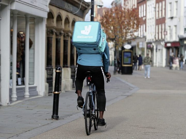 Deliveroo predicts earnings boost after job cuts