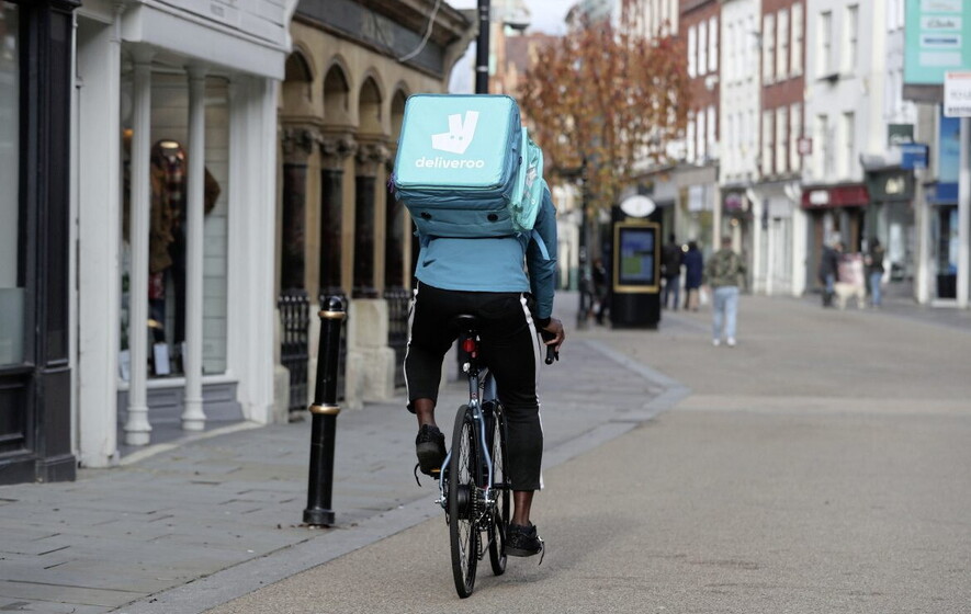 Deliveroo predicts earnings boost after job cuts